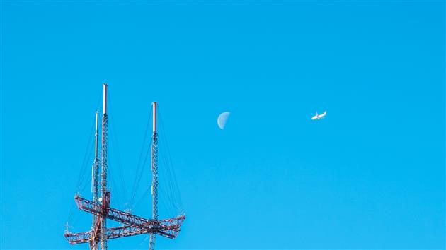 A Plane, the Moon and Sutro Tower