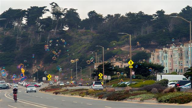 Photo of bubbles drifting over the Great Highway in San Francisco