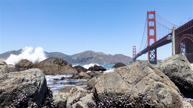 Wave breaks in front of the Golden Gate Bridge